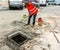 Worker prepares the mortar with a fast setting cement