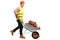 Worker pushing a wheelbarrow with bricks