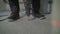 Worker put a plastic dowel in the concrete floor. Worker drills concrete floor for installation. Flooring. The process