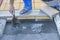 Worker puts mortal for concrete pavers