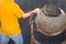 Worker putting sand in cement mixer