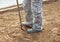 Worker with rake while crushing the ground