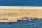 Worker repairing a breakwater, Barcelona