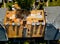 A worker replace shingles on the roof of a home repairing the roof of home