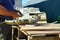 a worker replaces a grinding disc on a grinding machine that is wasted during metal cutting