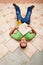 Worker resting on ceramic floor tiles