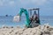 Worker riding excavator at construction site