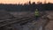 Worker running along railway