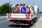 A worker`s truck with roadsigns at a road construction site