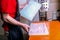 A worker seals the mold for pouring plastic. Manufacturing of plastic products. Medium business concept. Hands close-up