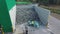 A worker segregates bottles, a rubbish dump, Poland, PuÅ‚awy, 06.2017, aerial view