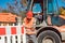 Worker setting up earthworks construction site