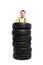 Worker is standing inside a pile of tires