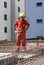 Worker Stands Among Rebar - Vertical