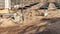 A worker transfers elements for the installation of the formwork at the construction site. Monolithic concrete formwork during the