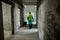 Worker in an unfinished building on a hospital construction site