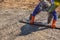 Worker using a wooden spatula for cement after Pouring ready-mixed concrete