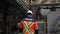 A worker walks along the gold mill.