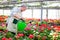 Worker watering plants