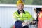 Worker wearing hardhat operating levers