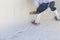 Worker Wearing Spiked Shoes Smoothing Wet Pool Plaster With Trowel