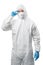 Worker wears medical protective suit or white coverall suit with mask and goggles