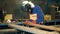 Worker welding construction by MIG welding. Clip. Worker welding the steel part by manual