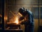 Worker welding steel structure in a metallurgical plant at night