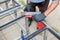 worker welds the steel structure at the construction site