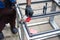 worker welds the steel structure at the construction site