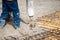 worker working on building a house. Worker and cement pump