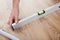 Worker working on laminate floor