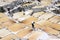 Worker working in the salt marshes of Cusco in Peru