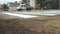 Workers apply by paint horizontal road marking zebra for Pedestrian crossing on crossroads in city street asphalt