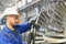 Workers assembling and quality control of gas turbines in a mode