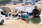 Workers in a boat with their vehicles waiting for cross the river in Guatemala