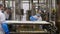 Workers at the cheese factory dairy preparing Ricotta cheese