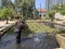 Workers cleaning a pond in the Sarona quarter