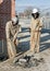 Workers Clearing Pavement