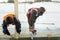 Workers collect the formwork for the ice hole