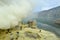 Workers collecting sulfur from volcano Ijen