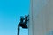 Workers on a construction lift are building a wooden shipyard Italy, Europe