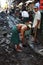 Workers fixing the road after the downpour in Myanmar