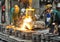 Workers in a foundry casting a metal workpiece - safety at work and teamwork