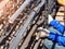 workers hands using steel wire and pincers to secure rebar