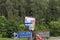 Workers hang up a billboard with voting information on constitutional amendments