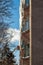 Workers knock down icicles from the roof in winter