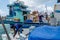 Workers loading goods in supply boat