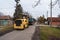 Workers with machinery preparing the road for new asphalt