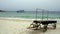 Workers and ocean, asian beach, Thailand